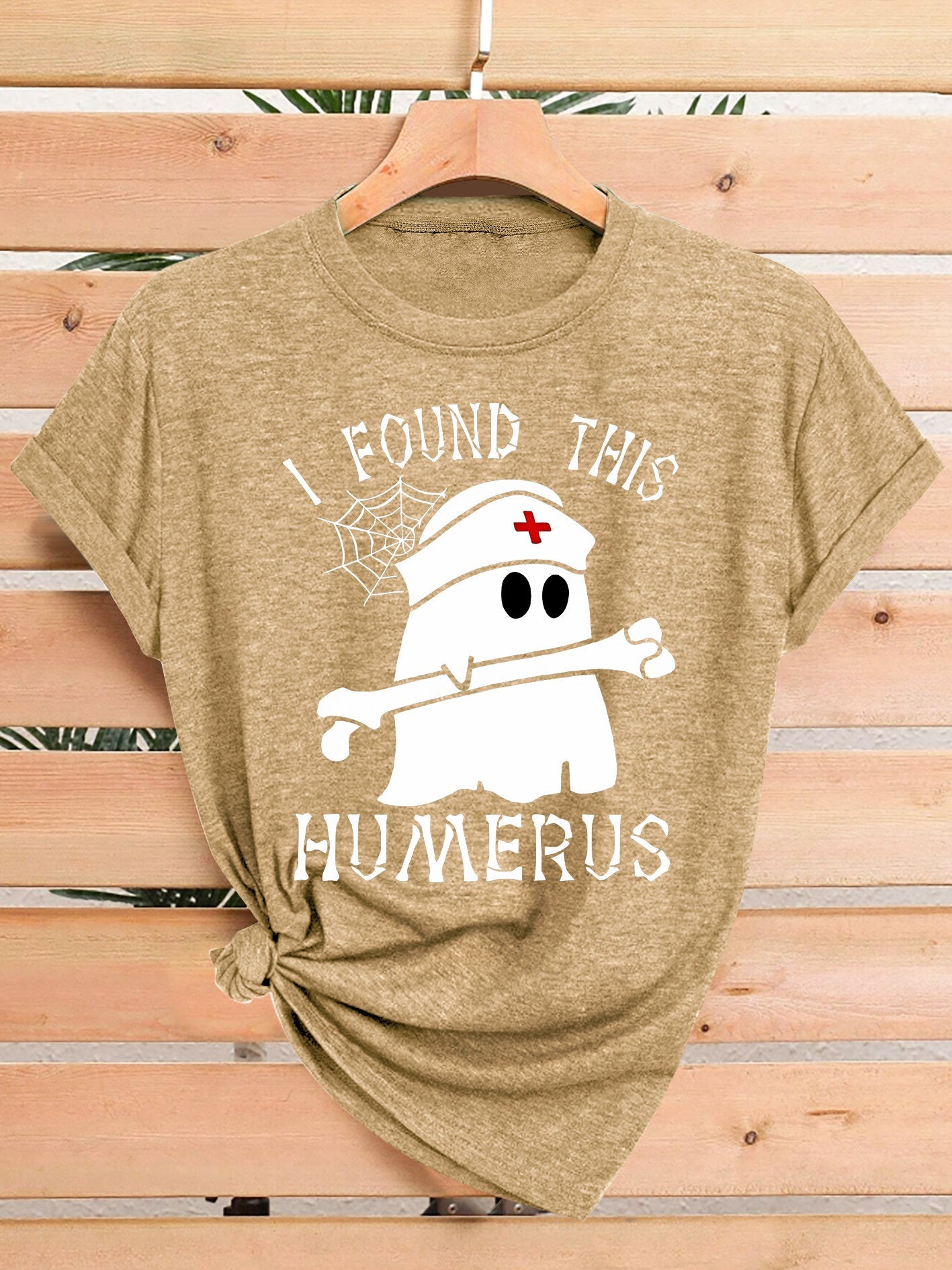 [Humor Graphic T-Shirt] Funny Humor Graphic T-Shirt for Women - "I Found This Humerus" Slogan & Mummy-Wrapped Skeleton Nurse Design | Casual Round Neck Short Sleeve Tee for Halloween, Themed Parties & Casual Attire, Machine Washable All-Season Comfort