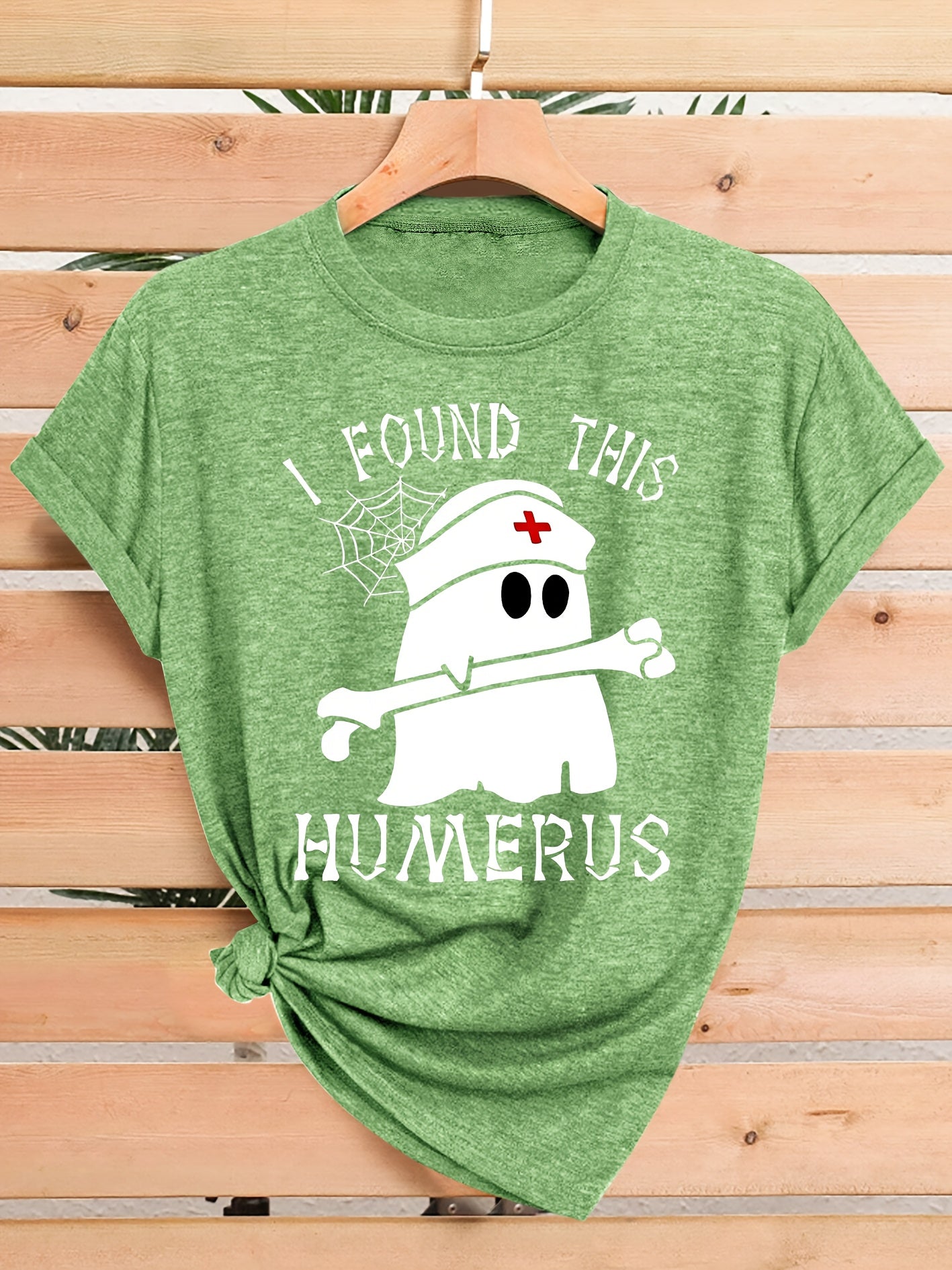 [Humor Graphic T-Shirt] Funny Humor Graphic T-Shirt for Women - "I Found This Humerus" Slogan & Mummy-Wrapped Skeleton Nurse Design | Casual Round Neck Short Sleeve Tee for Halloween, Themed Parties & Casual Attire, Machine Washable All-Season Comfort