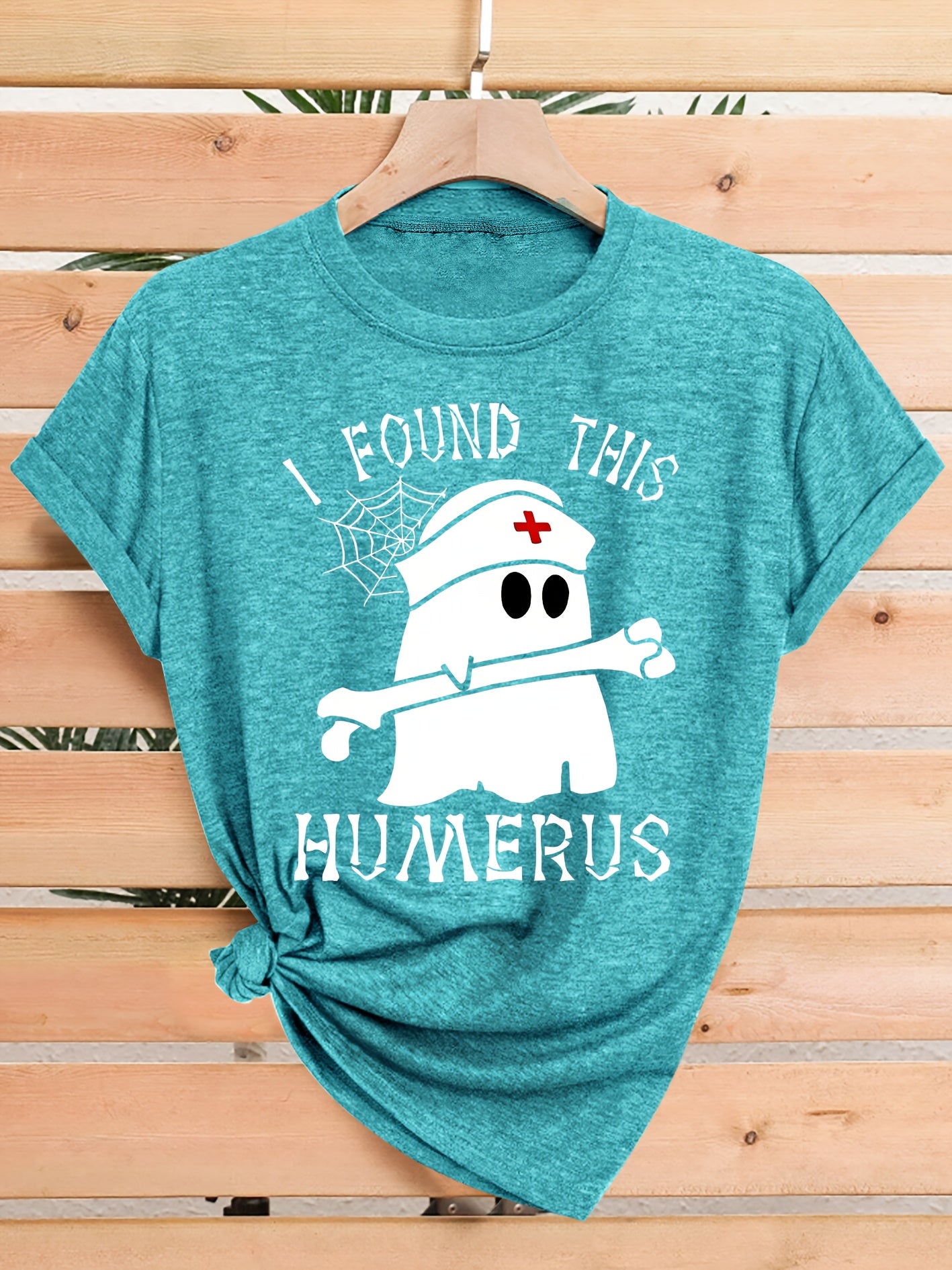 [Humor Graphic T-Shirt] Funny Humor Graphic T-Shirt for Women - "I Found This Humerus" Slogan & Mummy-Wrapped Skeleton Nurse Design | Casual Round Neck Short Sleeve Tee for Halloween, Themed Parties & Casual Attire, Machine Washable All-Season Comfort