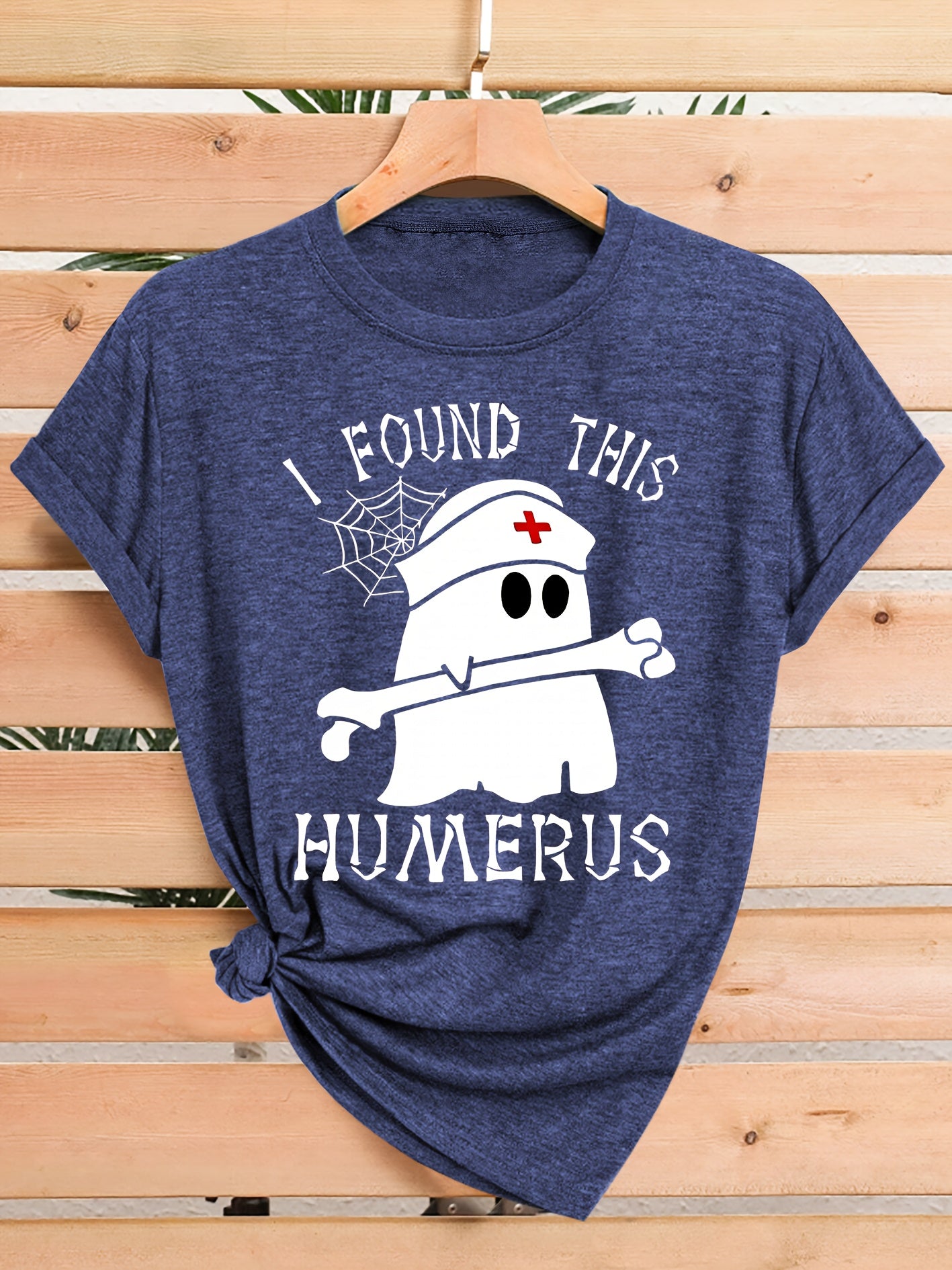 [Humor Graphic T-Shirt] Funny Humor Graphic T-Shirt for Women - "I Found This Humerus" Slogan & Mummy-Wrapped Skeleton Nurse Design | Casual Round Neck Short Sleeve Tee for Halloween, Themed Parties & Casual Attire, Machine Washable All-Season Comfort