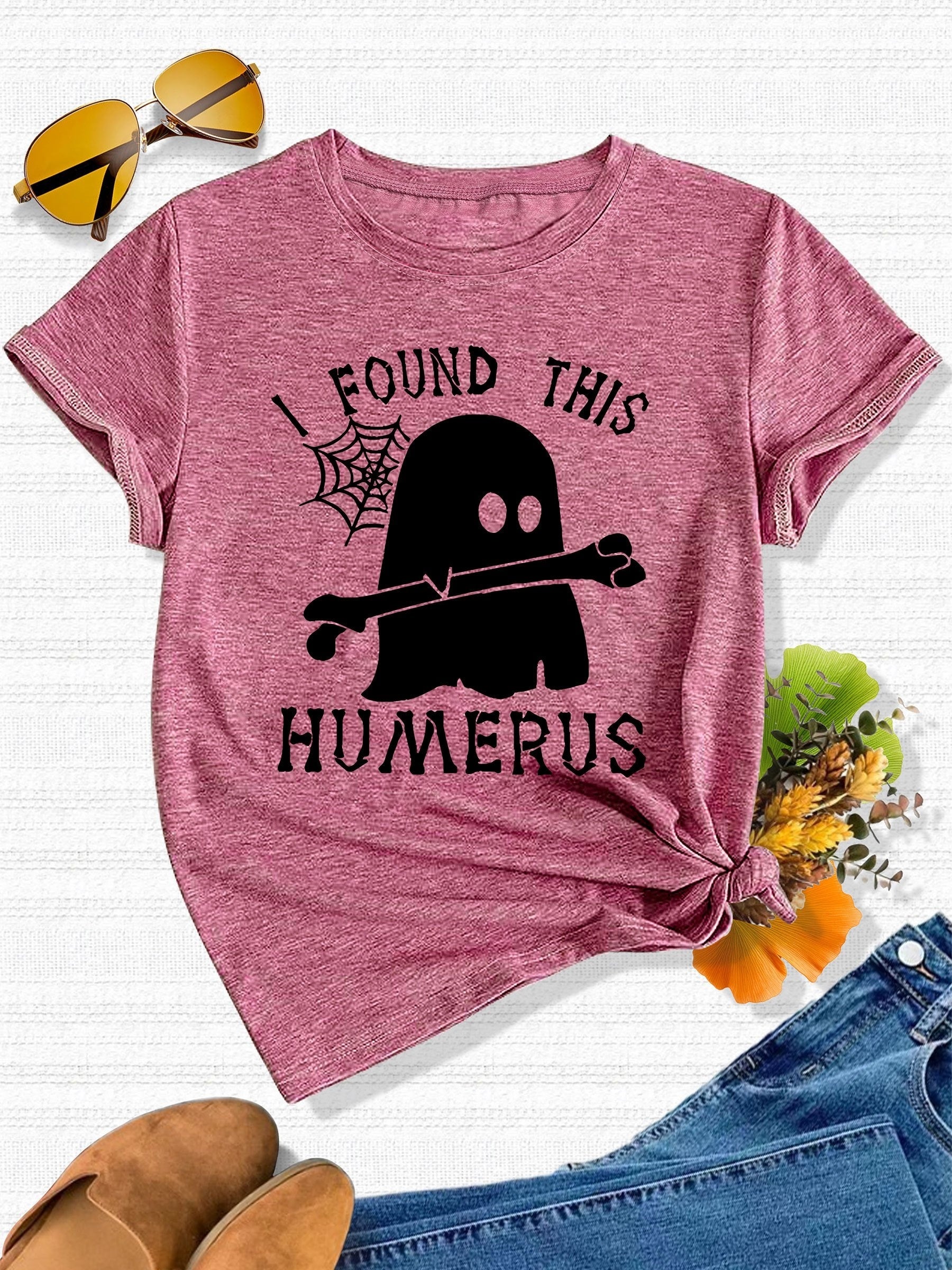 [Humor Graphic T-Shirt] Funny Humor Graphic T-Shirt for Women - "I Found This Humerus" Slogan & Mummy-Wrapped Skeleton Nurse Design | Casual Round Neck Short Sleeve Tee for Halloween, Themed Parties & Casual Attire, Machine Washable All-Season Comfort