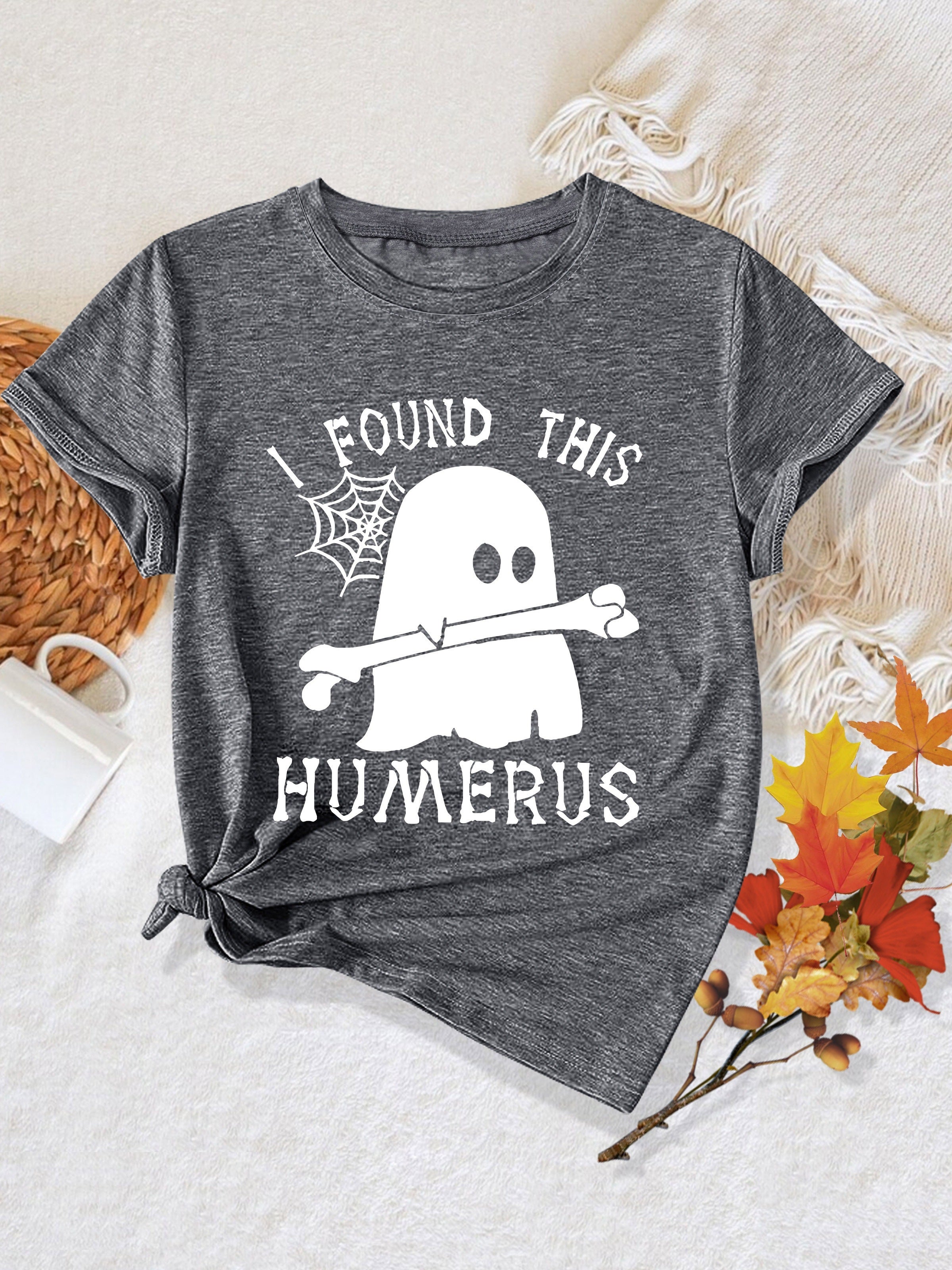 [Humor Graphic T-Shirt] Funny Humor Graphic T-Shirt for Women - "I Found This Humerus" Slogan & Mummy-Wrapped Skeleton Nurse Design | Casual Round Neck Short Sleeve Tee for Halloween, Themed Parties & Casual Attire, Machine Washable All-Season Comfort