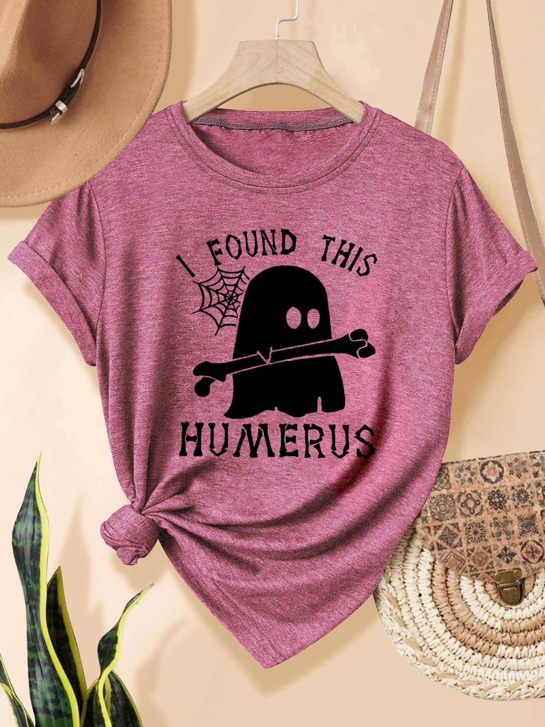 [Humor Graphic T-Shirt] Funny Humor Graphic T-Shirt for Women - "I Found This Humerus" Slogan & Mummy-Wrapped Skeleton Nurse Design | Casual Round Neck Short Sleeve Tee for Halloween, Themed Parties & Casual Attire, Machine Washable All-Season Comfort