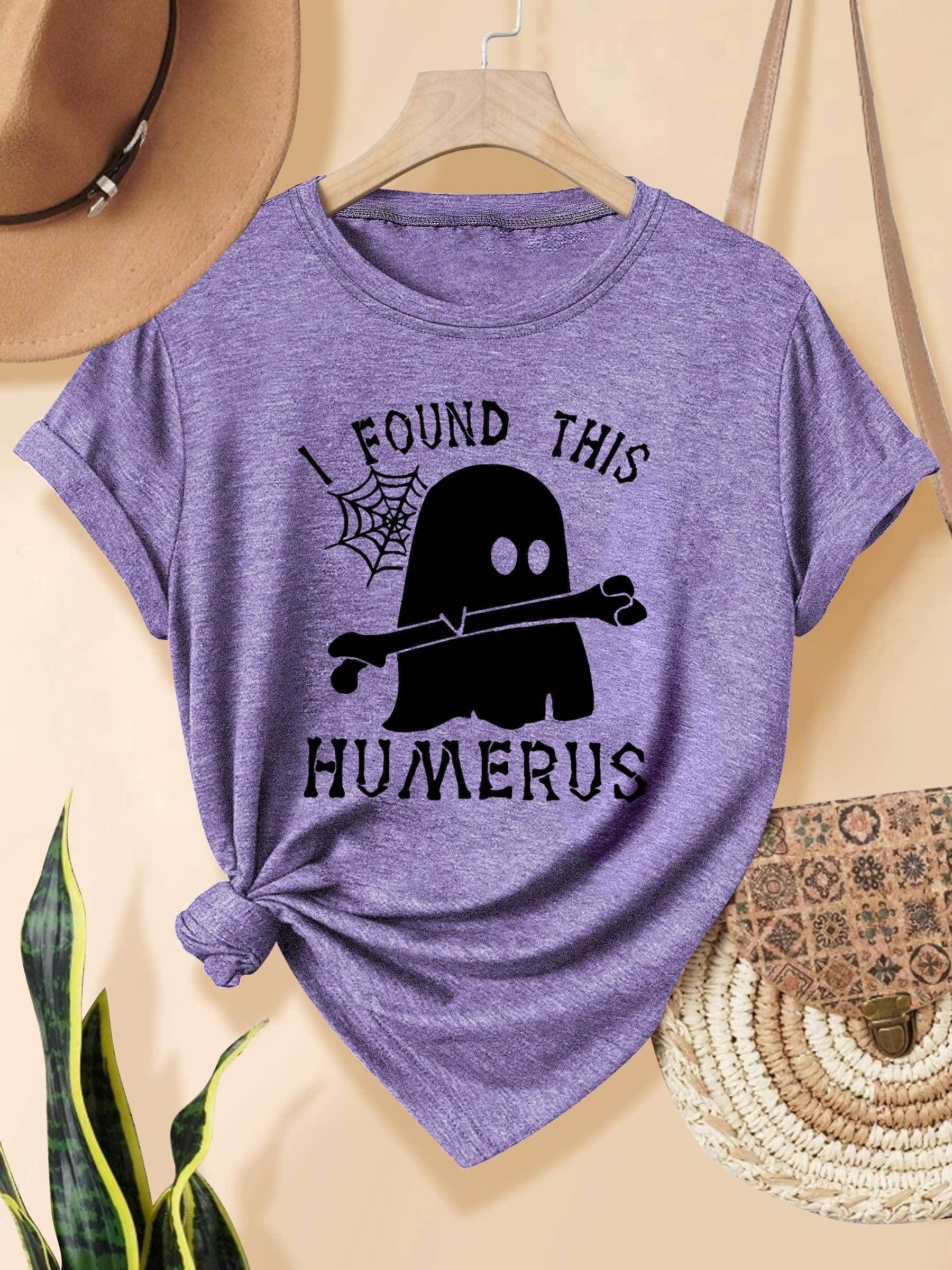 [Humor Graphic T-Shirt] Funny Humor Graphic T-Shirt for Women - "I Found This Humerus" Slogan & Mummy-Wrapped Skeleton Nurse Design | Casual Round Neck Short Sleeve Tee for Halloween, Themed Parties & Casual Attire, Machine Washable All-Season Comfort